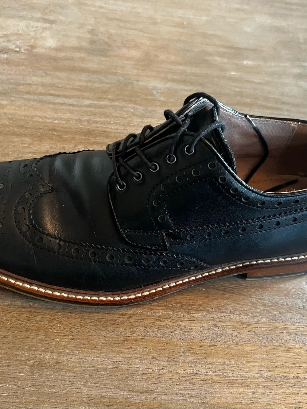Classic Black Leather Wingtip Oxfords with Contrast Welt